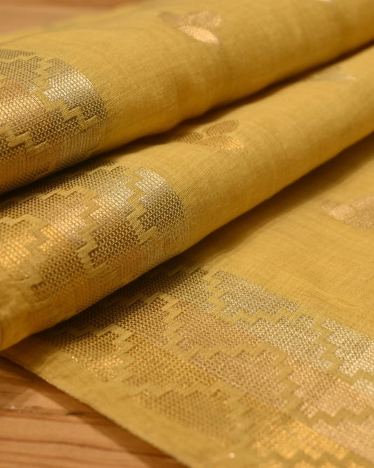 PALE YELLOW MUNGA CHANDERI SAREE WITH TEMPLE BORDER AND SILVER-GOLDEN BOOTIES