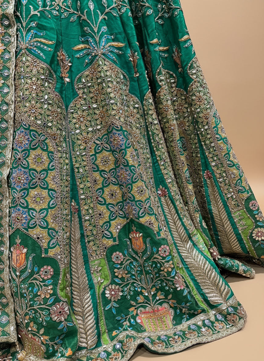 EMERALD GREEN CREPE SILK PICHWAI LEHENGA WITH AARI, DORI, MIRROR & SEQUINS WORK HIGHLIGHTS (DELIVERY IN 30 DAYS)