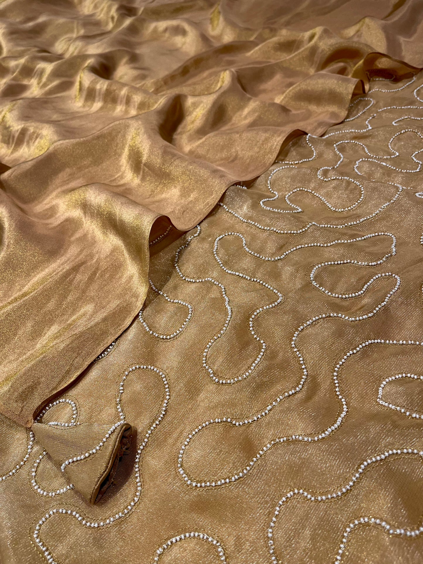 GOLDEN TISSUE SAREE WITH EMBROIDERED TASSELS & PEARL-WORK BLOUSE BY SIDDHAIKA