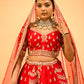 RED BRIDAL WEDDING LEHENGA WITH THREE-PANEL DESIGN, 6-METER FLAIR, DOUBLE DUPATTA, POTLI & EMBROIDERED TASSELS