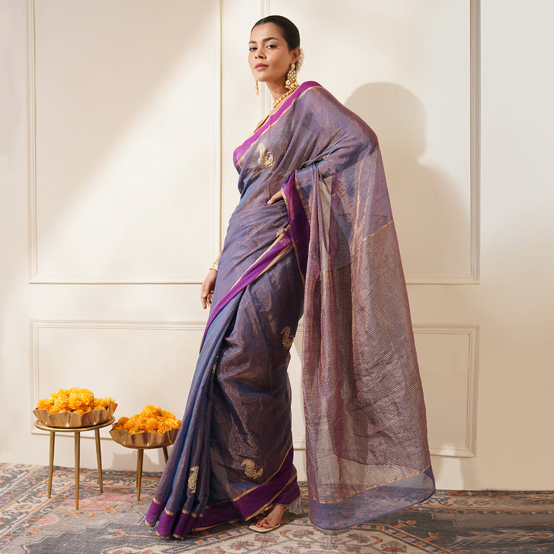 PURPLE COLOR CHANDERI TISSUE SAREE EMBELLISHED WITH ZARDOZI EMBROIDERED PEACOCK MOTIFS