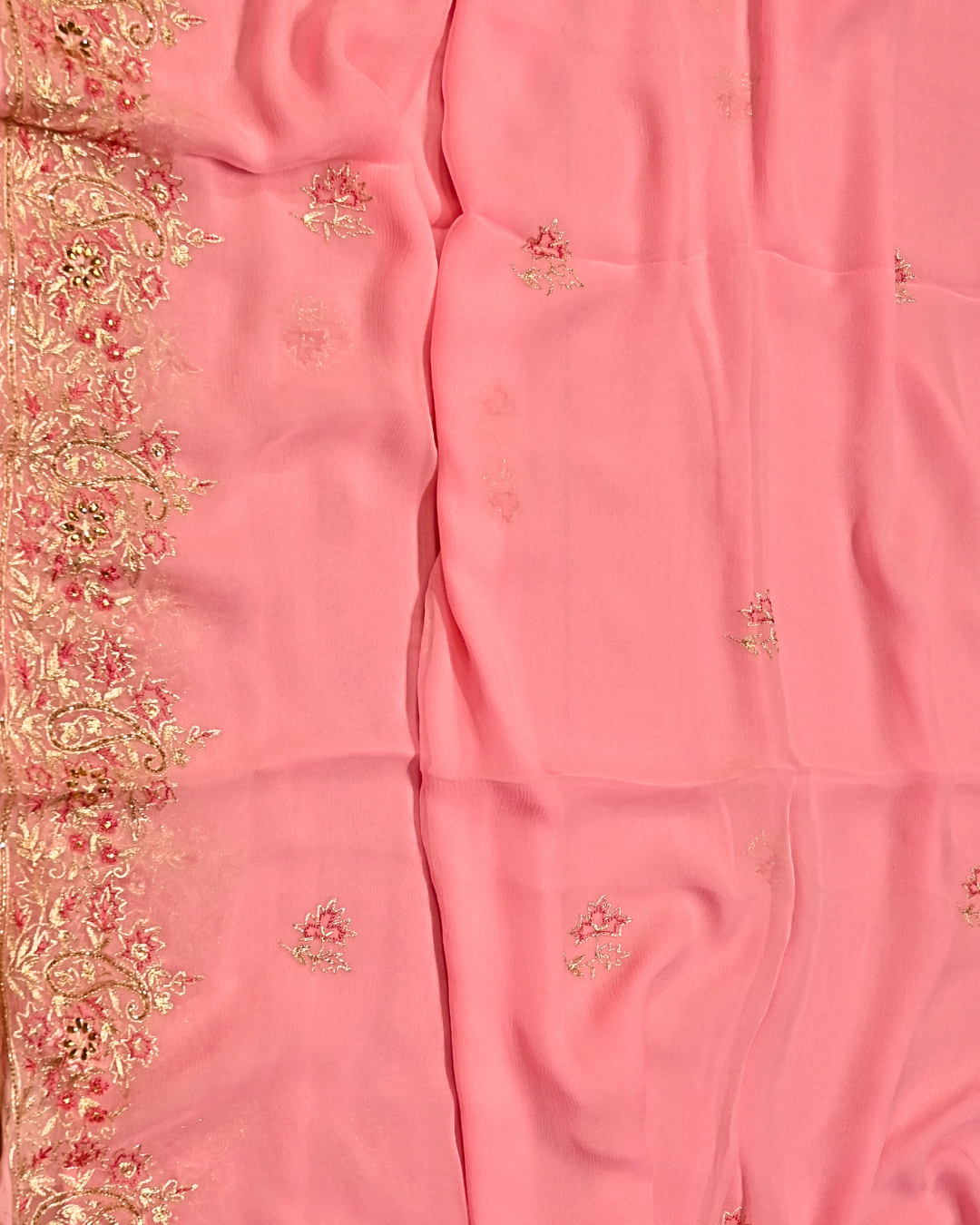 ELECTRIC BABY PINK COLOUR ZARI AARI & RESHAM EMBROIDERED BORDER, BOOTIES IN PLANT BASED, PINK COLOUR CHIFFON SAREE
