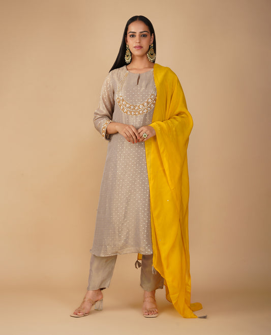 (DELIVERY TIME 20 DAYS) GREY TISSUE READYMADE SUIT WITH ZARI WEAVE, HAND EMBROIDERY, PANTS & CONTRAST DUPATTA