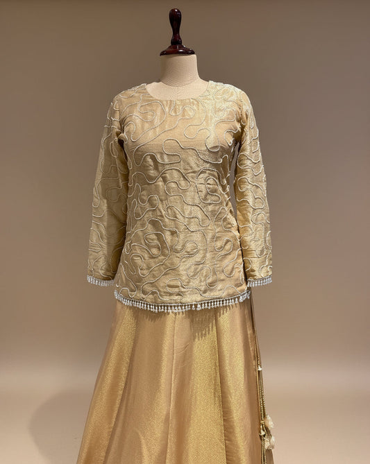 GOLDEN TISSUE PEARL-WORK KURTA WITH GOLDEN TISSUE PLAIN LEHENGA & EMBROIDERED TASSELS BY SIDDHAIKA