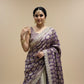 IVORY-PURPLE COLOUR TISSUE GEORGETTE BANDHANI LEHENGA EMBELLISHED WITH GOTA PATTI & ZARDOZI WORK