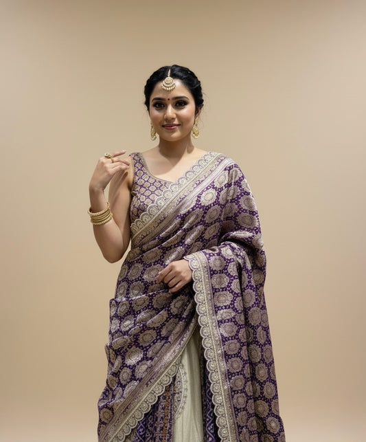 IVORY-PURPLE COLOUR TISSUE GEORGETTE BANDHANI LEHENGA EMBELLISHED WITH GOTA PATTI & ZARDOZI WORK