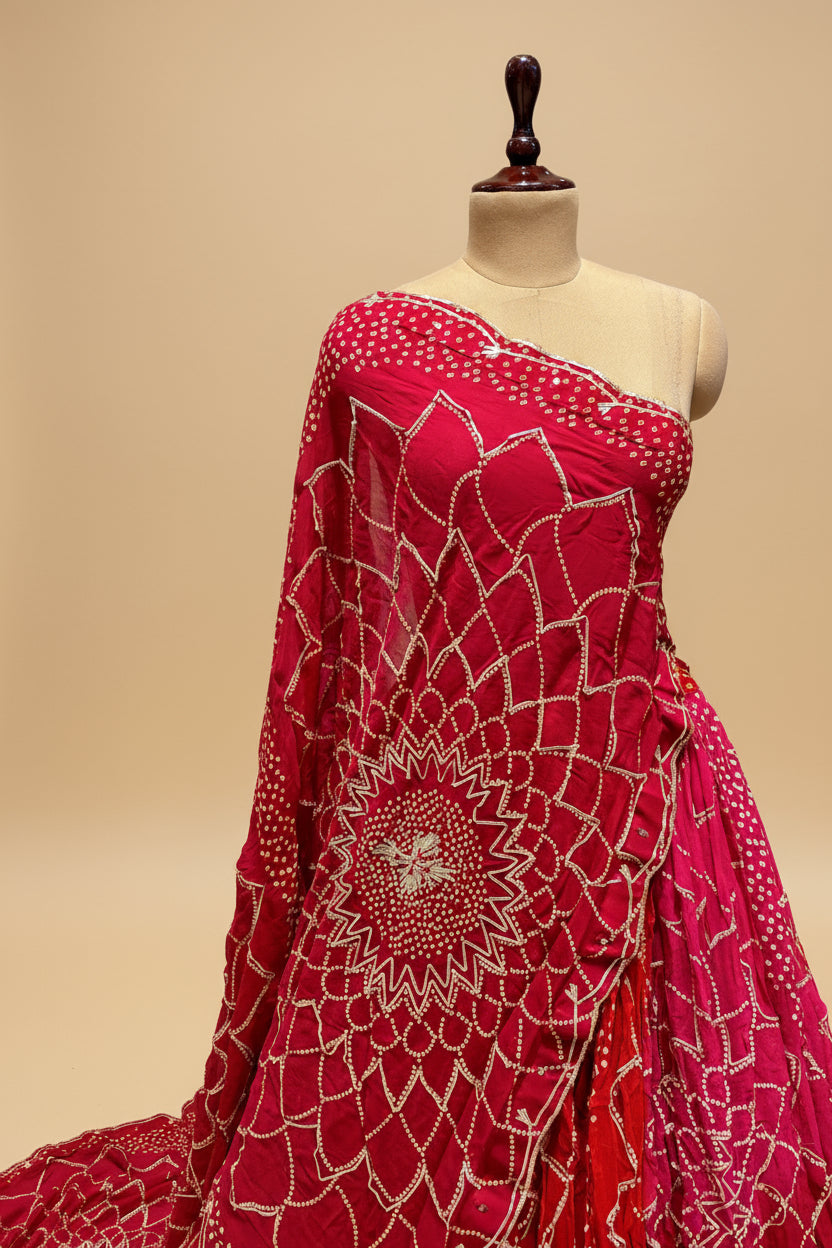 SHADED RED GEORGETTE BANDHANI LEHENGA EMBELLISHED WITH GOTA WORK