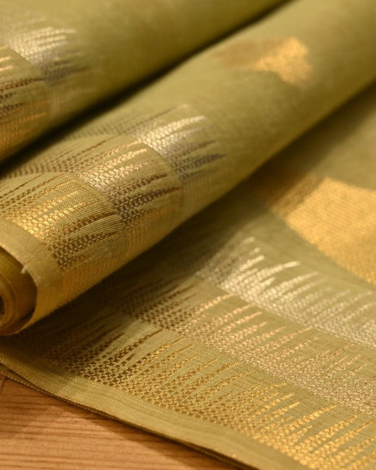 PASTEL PISTA GREEN MUNGA CHANDERI SAREE WITH TEMPLE BORDER AND SILVER-GOLDEN BOOTIES