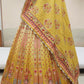 pale yellow colour printed silk Lehenga embellished with cutdana work