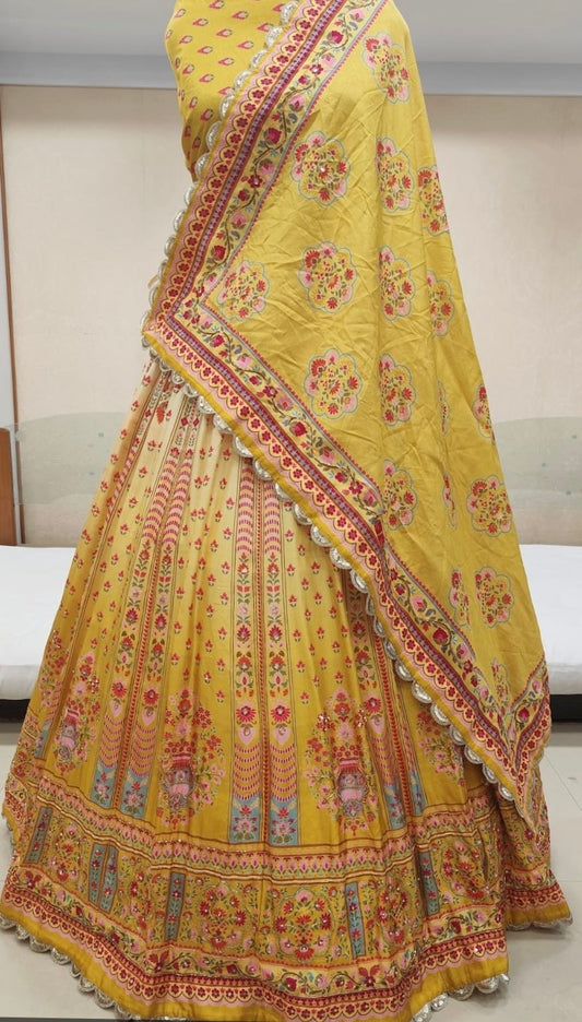 pale yellow colour printed silk Lehenga embellished with cutdana work
