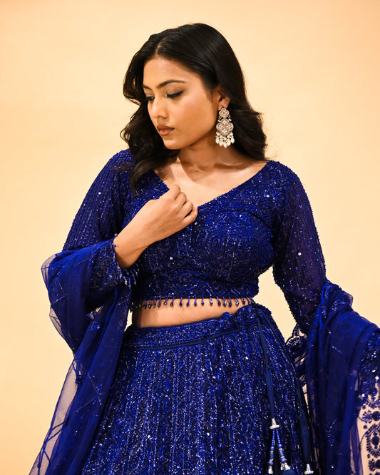 ROYAL BLUE SEQUINS EMBROIDERED LEHENGA WITH CROP TOP & NET DUPATTA