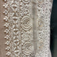 IVORY GEORGETTE SELF-RESHAM EMBROIDERED UNSTITCHED SUIT WITH PINK LOTUS PRINT