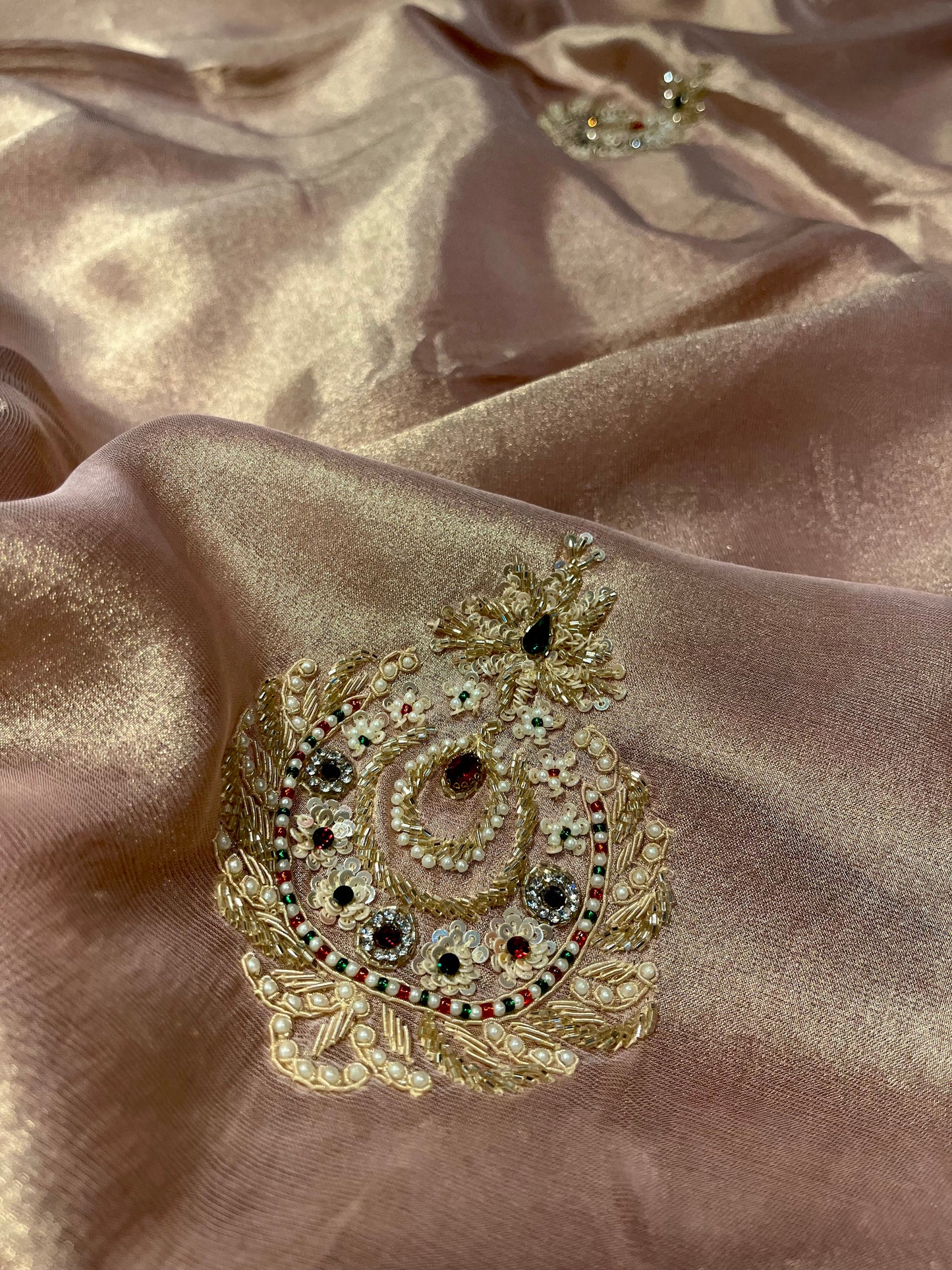 ROSE GOLD COLOR TISSUE SAREE EMBELLISHED WITH CUTDANA, SEQUINS & PEARLS WORK PAIRED WITH CONTRAST BLOUSE