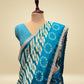 TURQUOISE COLOUR ART SILK LEHERIYA–BANDHANI PRINTED SAREE WITH LACE BORDER