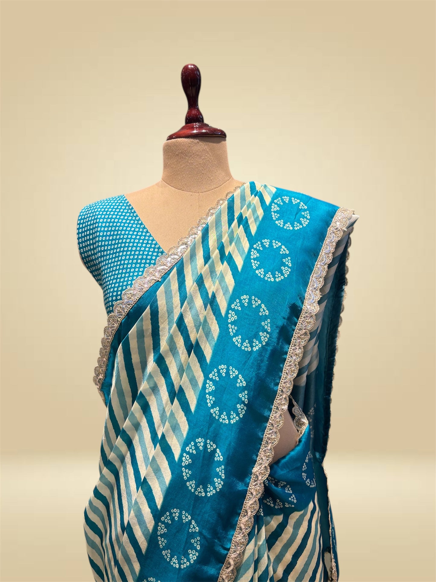TURQUOISE COLOUR ART SILK LEHERIYA–BANDHANI PRINTED SAREE WITH LACE BORDER