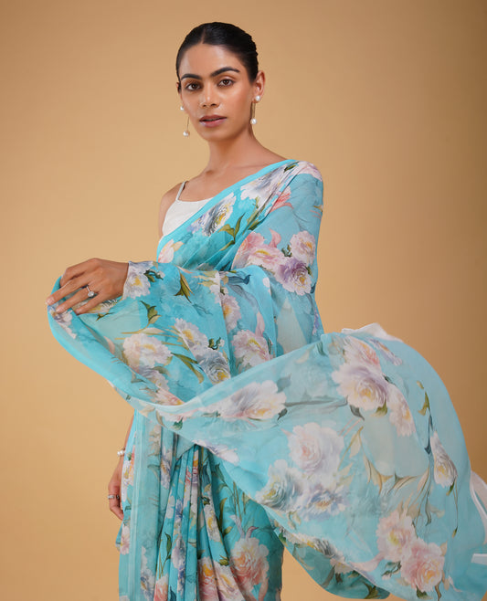 POWDER BLUE FLORAL PRINTED PURE PLATINUM CHIFFON SAREE WITH SELF PRINTED CREPE BLOUSE