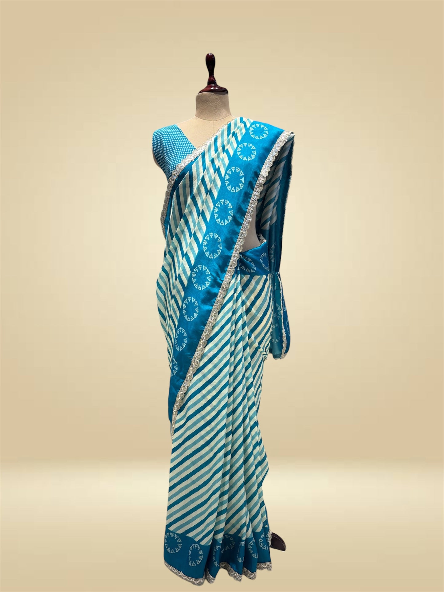 TURQUOISE COLOUR ART SILK LEHERIYA–BANDHANI PRINTED SAREE WITH LACE BORDER