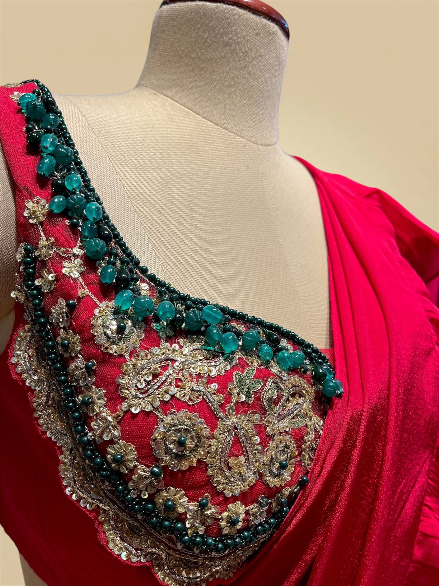 RASPBERRY COLOUR CHINON RUFFLE SAREE WITH READYMADE BLOUSE EMBELLISHED WITH SEQUINS & PITTA WORK