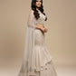 IVORY–GOLDEN FISHCUT LEHENGA WITH EMBROIDERED CROP TOP & NET CAPE