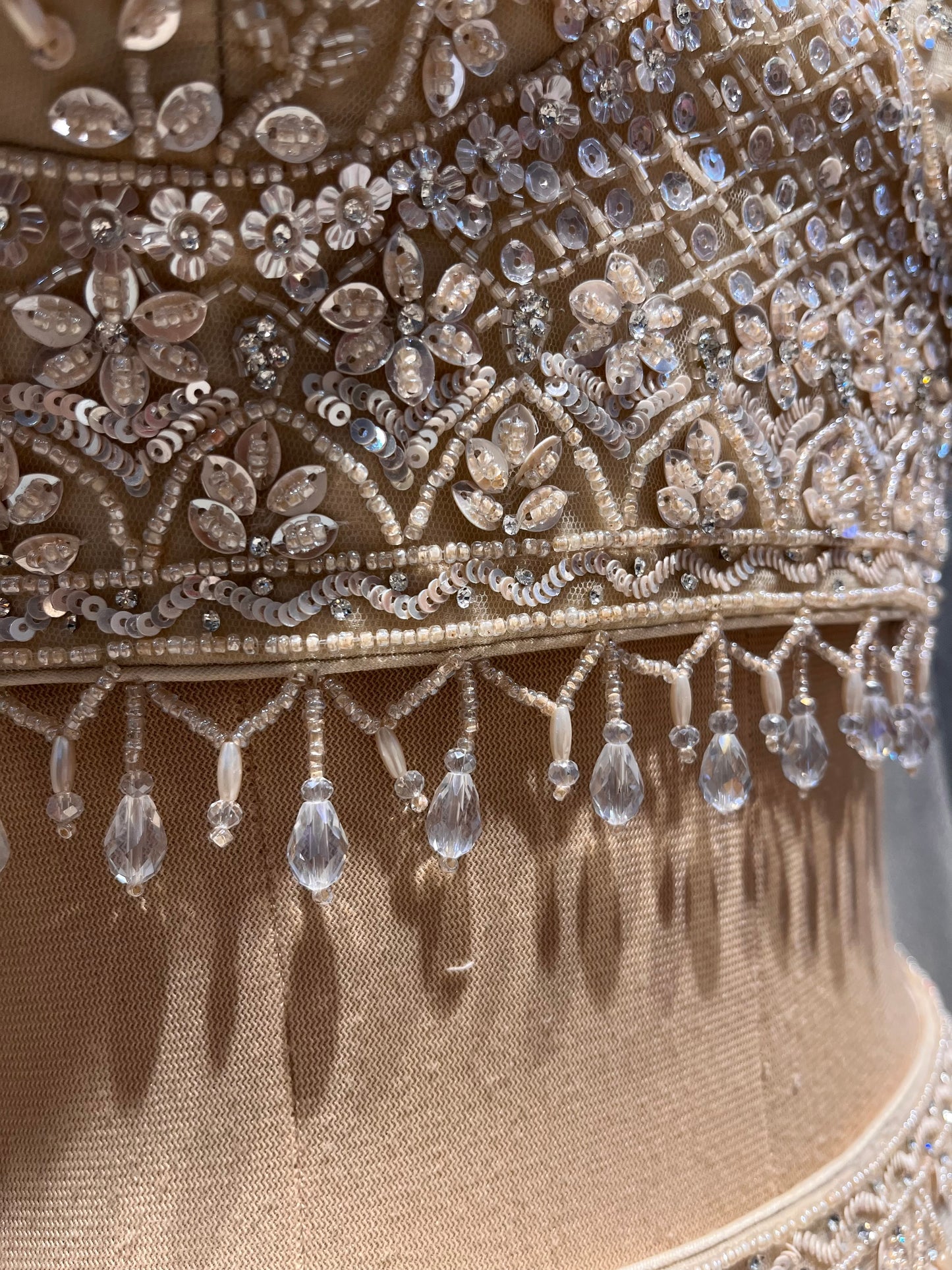 IVORY–GOLDEN FISHCUT LEHENGA WITH EMBROIDERED CROP TOP & NET CAPE