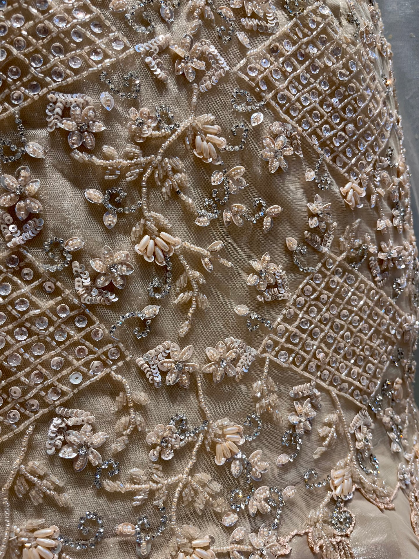 IVORY–GOLDEN FISHCUT LEHENGA WITH EMBROIDERED CROP TOP & NET CAPE