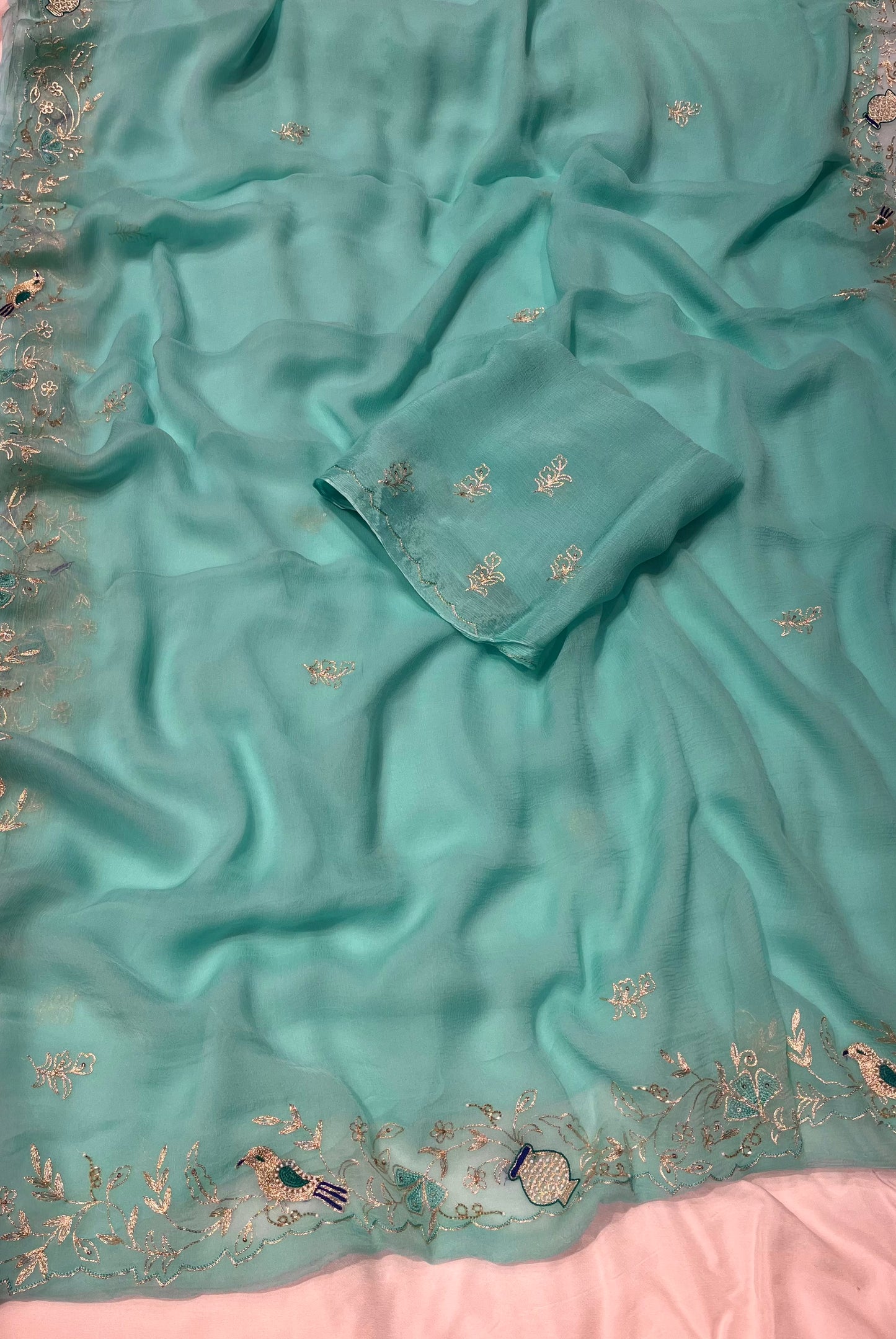 LIGHT BLUE CHIFFON SAREE EMBROIDERED WITH AARI WORK - Kothari Sons