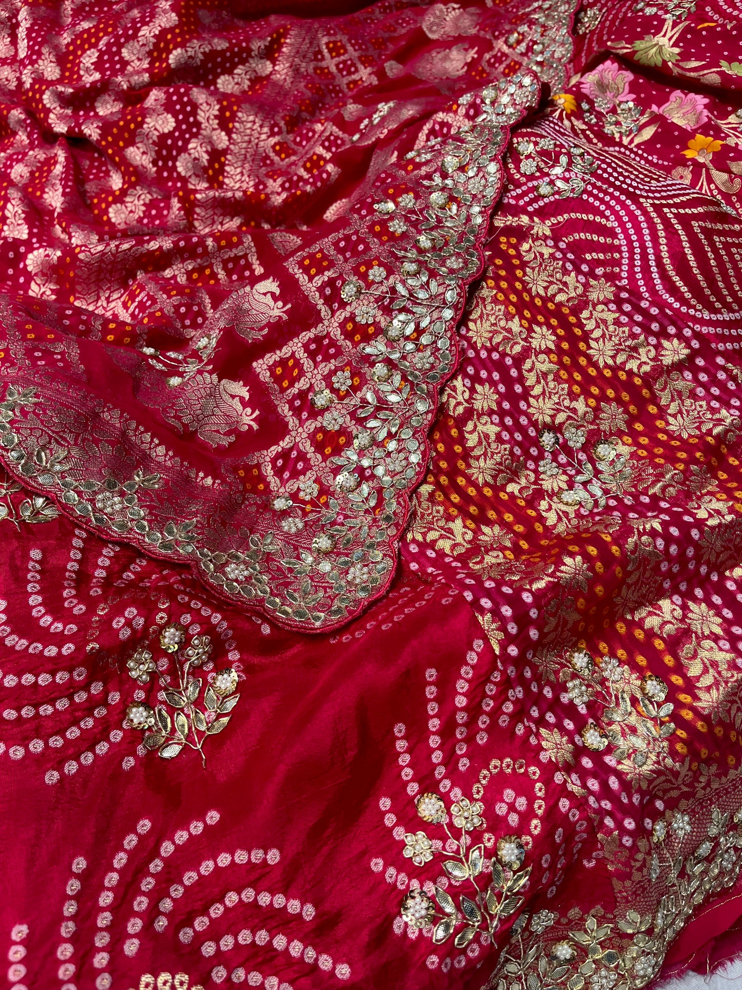 RASPBERRY PINK GEORGETTE BANDHANI LEHENGA EMBELLISHED WITH GOTA PATTI & ZARDOZI WORK