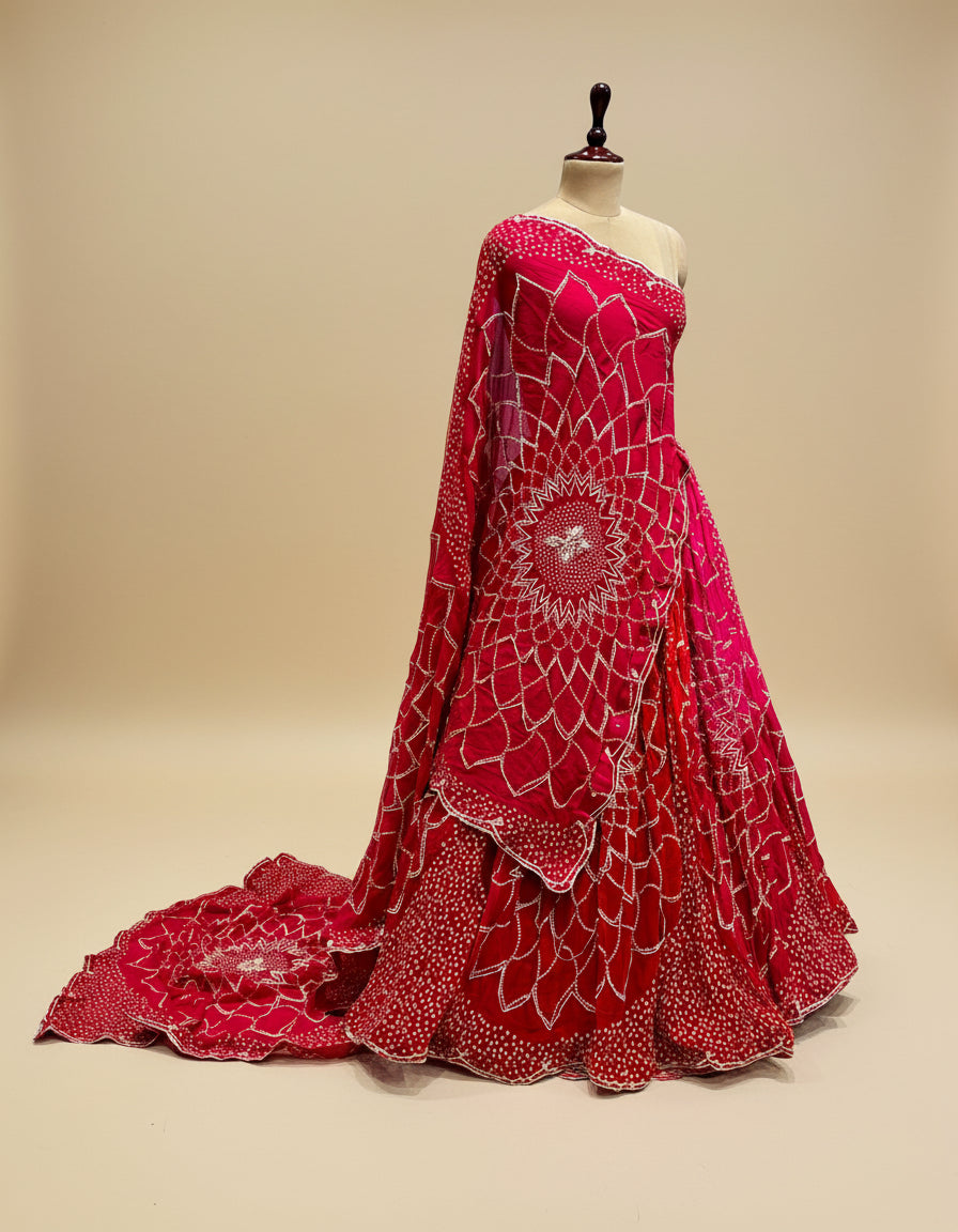 SHADED RED GEORGETTE BANDHANI LEHENGA EMBELLISHED WITH GOTA WORK