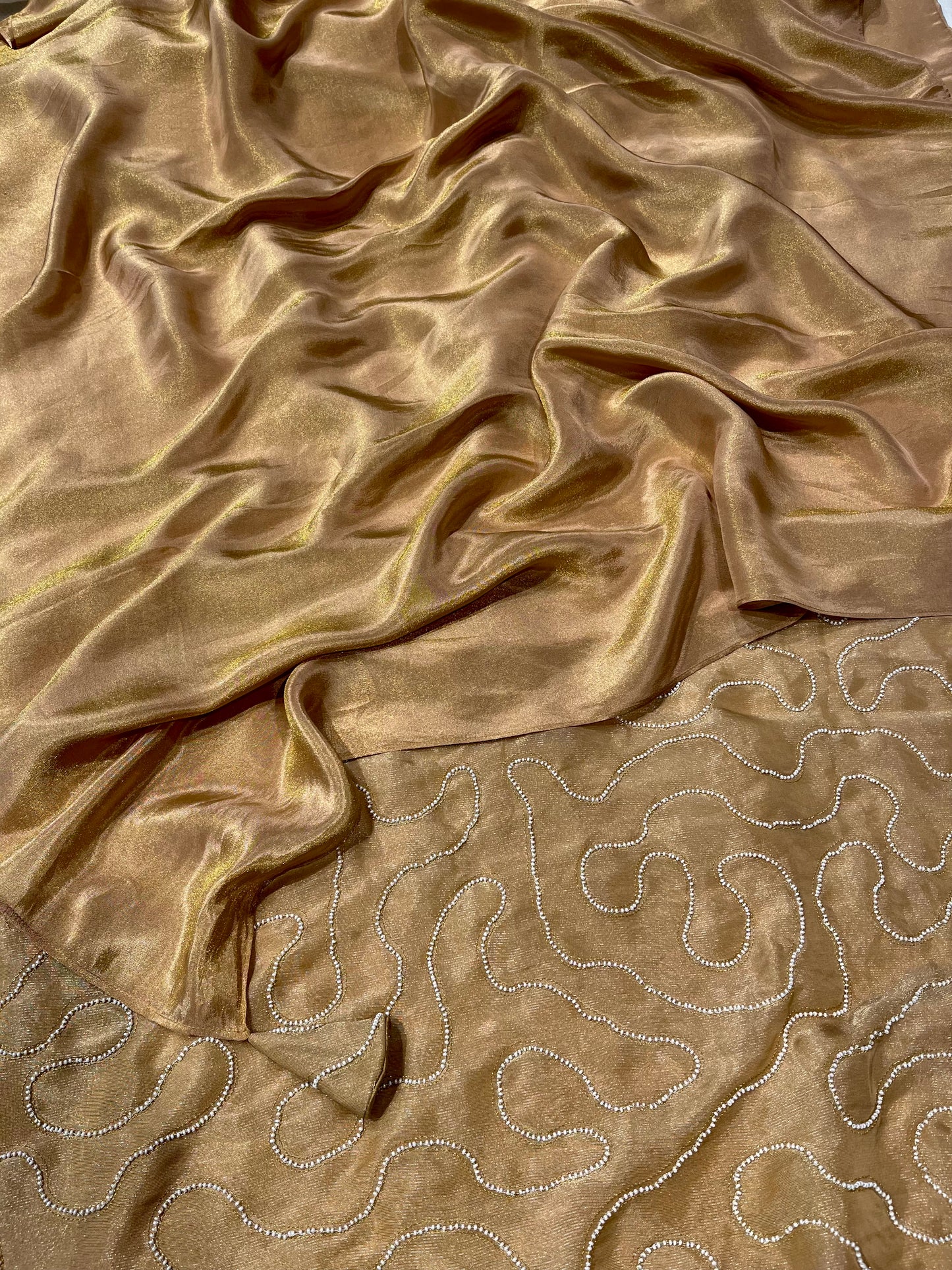 GOLDEN TISSUE SAREE WITH EMBROIDERED TASSELS & PEARL-WORK BLOUSE BY SIDDHAIKA