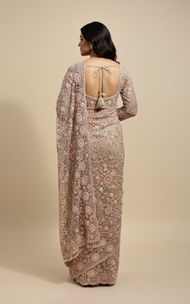 PASTEL NET EMBROIDERED SAREE WITH READYMADE BLOUSE EMBELLISHED WITH RESHAM, CUTDANA & PEARL WORK