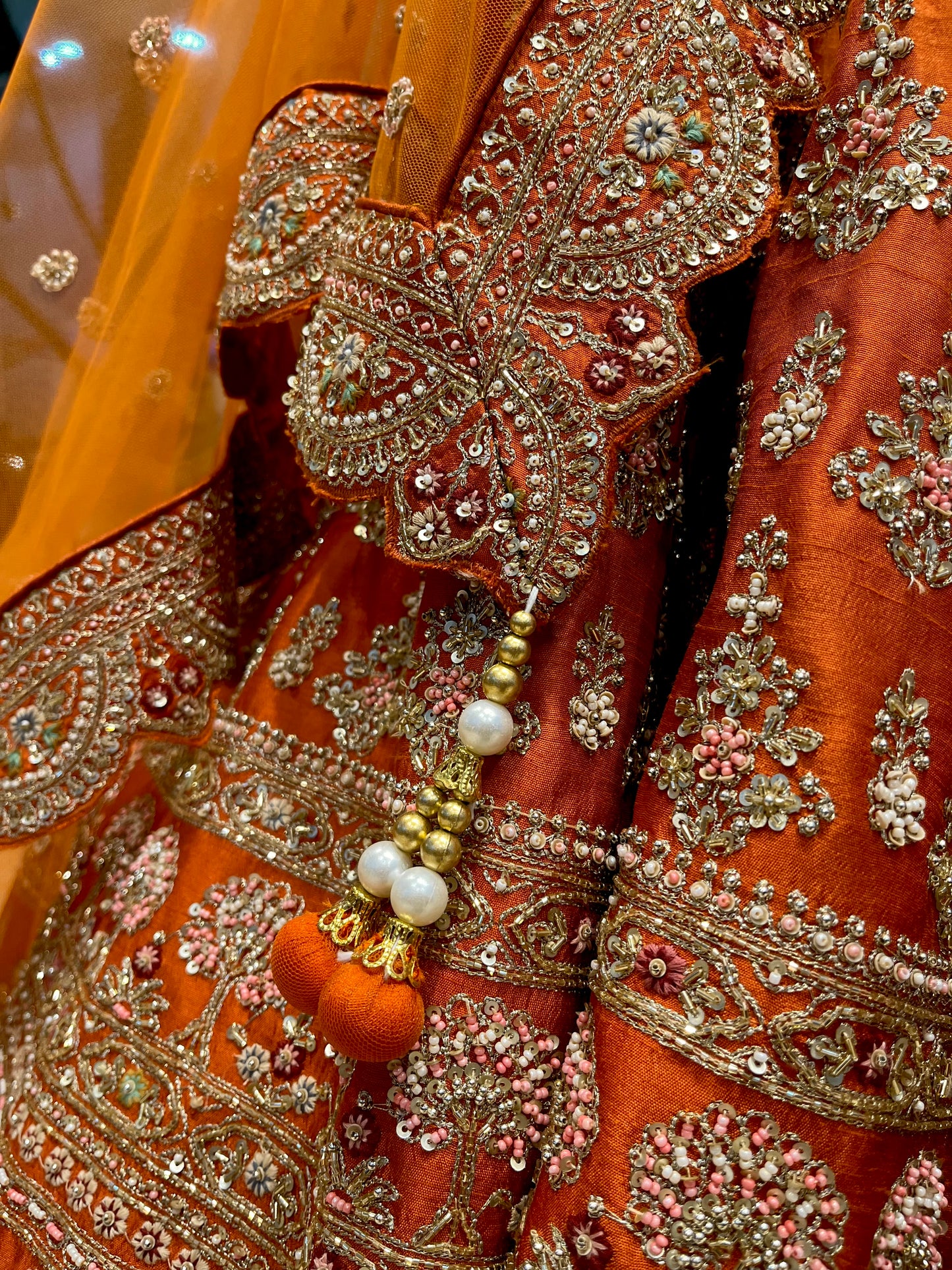 ORANGE BRIDAL LEHENGA WITH AARI ZARDOZI & PEARL HAND EMBROIDERY
