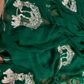 BOTTLE GREEN CHIFFON SAREE WITH INTRICATE AARI ZARDOZI EMBROIDERED ELEPHANT TEMPLE MOTIFS