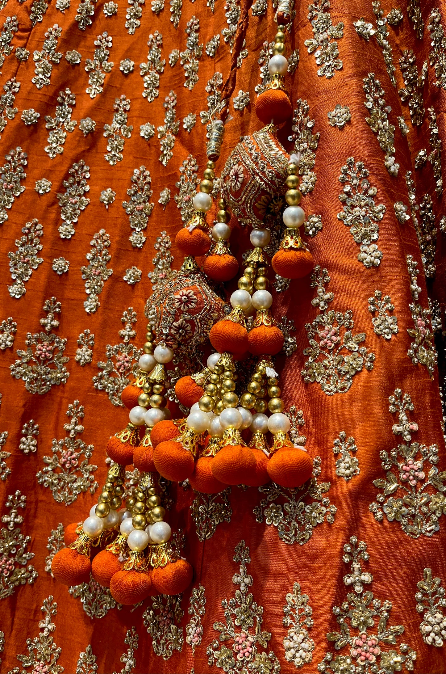 ORANGE BRIDAL LEHENGA WITH AARI ZARDOZI & PEARL HAND EMBROIDERY