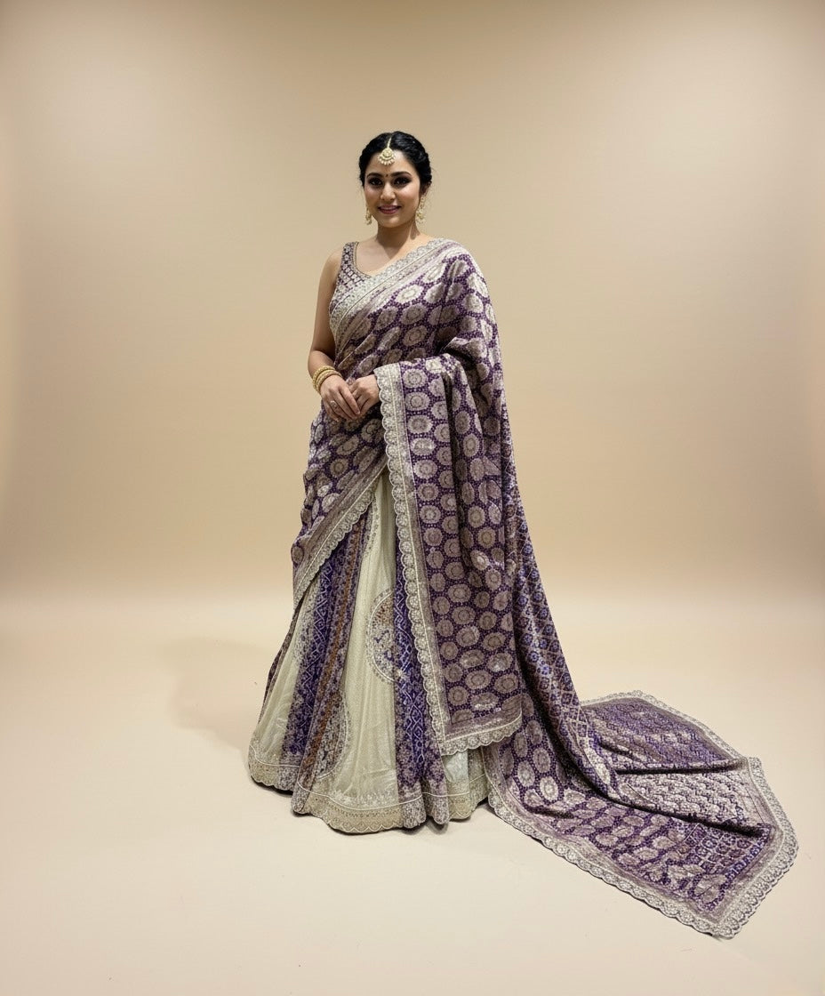 IVORY-PURPLE COLOUR TISSUE GEORGETTE BANDHANI LEHENGA EMBELLISHED WITH GOTA PATTI & ZARDOZI WORK