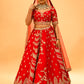 RED BRIDAL WEDDING LEHENGA WITH THREE-PANEL DESIGN, 6-METER FLAIR, DOUBLE DUPATTA, POTLI & EMBROIDERED TASSELS