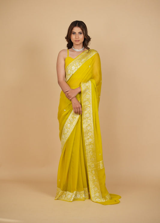 OLIVE YELLOW PURE CHIFFON SAREE WITH SILVER ZARI BANARASI BORDER & PALLA ( DELIVERY IN 20 DAYS )