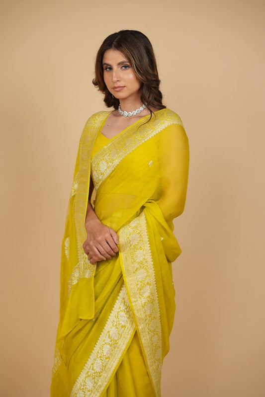 OLIVE YELLOW PURE CHIFFON SAREE WITH SILVER ZARI BANARASI BORDER & PALLA ( DELIVERY IN 20 DAYS )