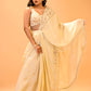 CHAMPAGNE GOLD CONTEMPORARY SAREE FEATURING EMBROIDERED BLOUSE, PALLA & FRINGE HIGHLIGHTS