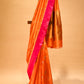 ORANGE CHANDERI HANDWOVEN SILK SAREE WITH CONTRAST PINK BORDER AND ZARI PALLA