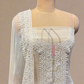 IVORY GEORGETTE SELF-RESHAM EMBROIDERED UNSTITCHED SUIT WITH PINK LOTUS PRINT