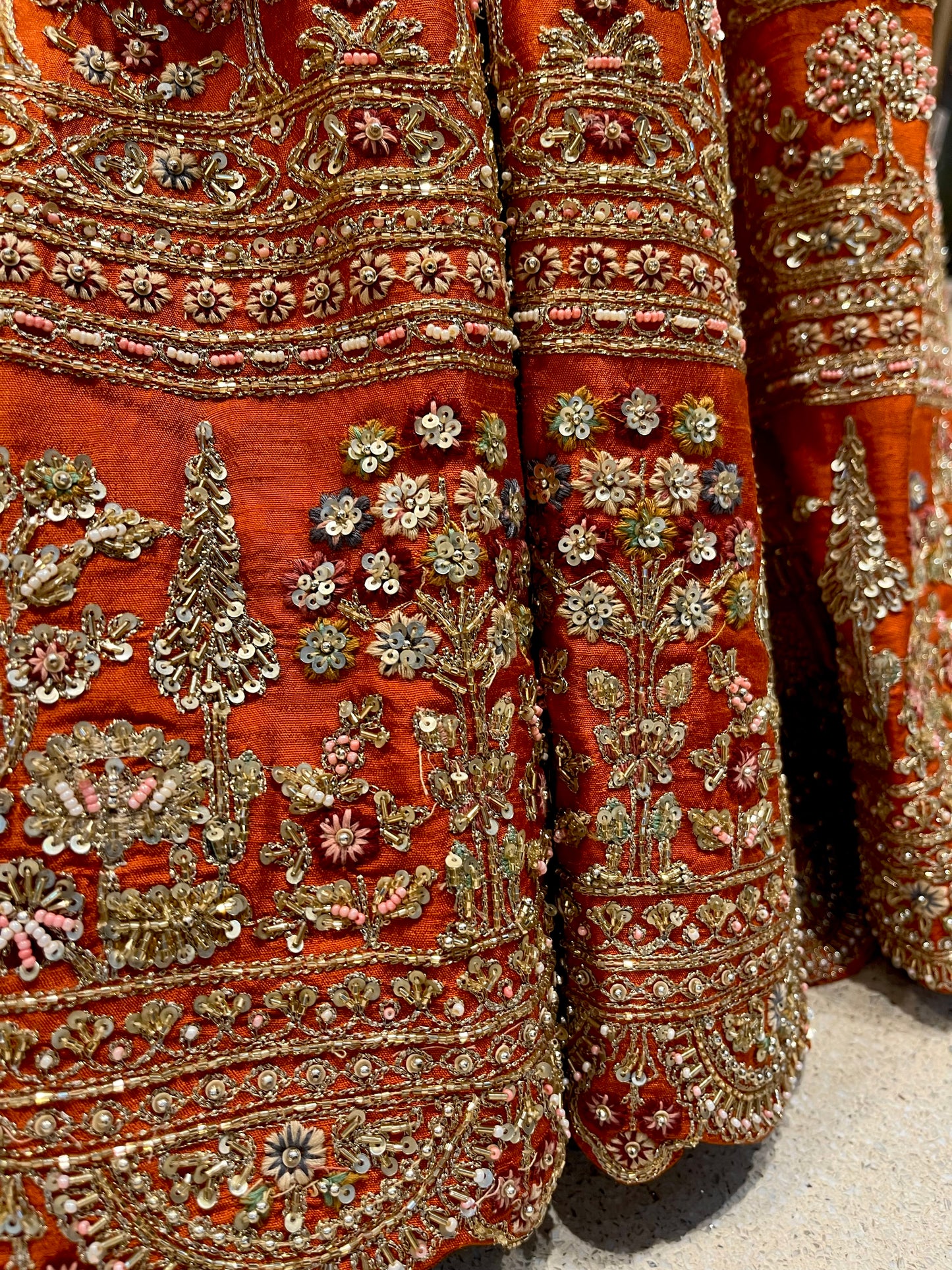 ORANGE BRIDAL LEHENGA WITH AARI ZARDOZI & PEARL HAND EMBROIDERY