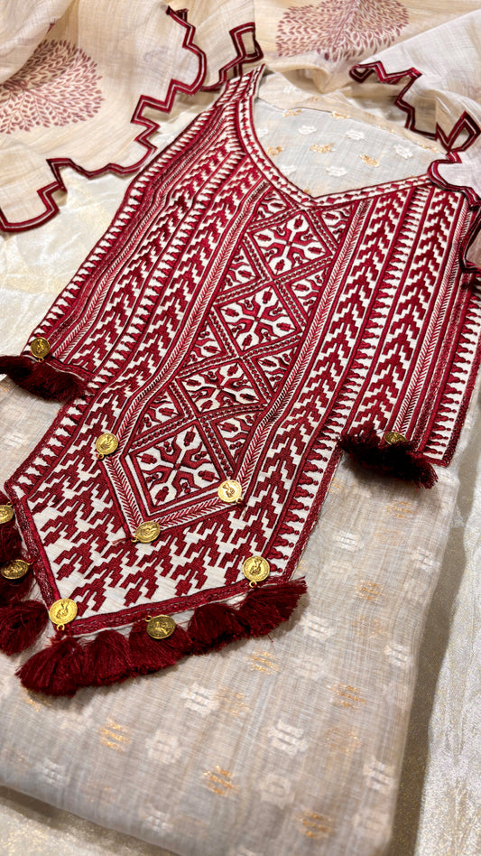 BEIGE JAMDANI DHAKAI COTTON UNSTITCHED SUIT EMBELLISHED WITH RED RESHAM EMBROIDERY, TASSELS ON KURTA & SCALLOP BORDER PRINTED DUPATTA