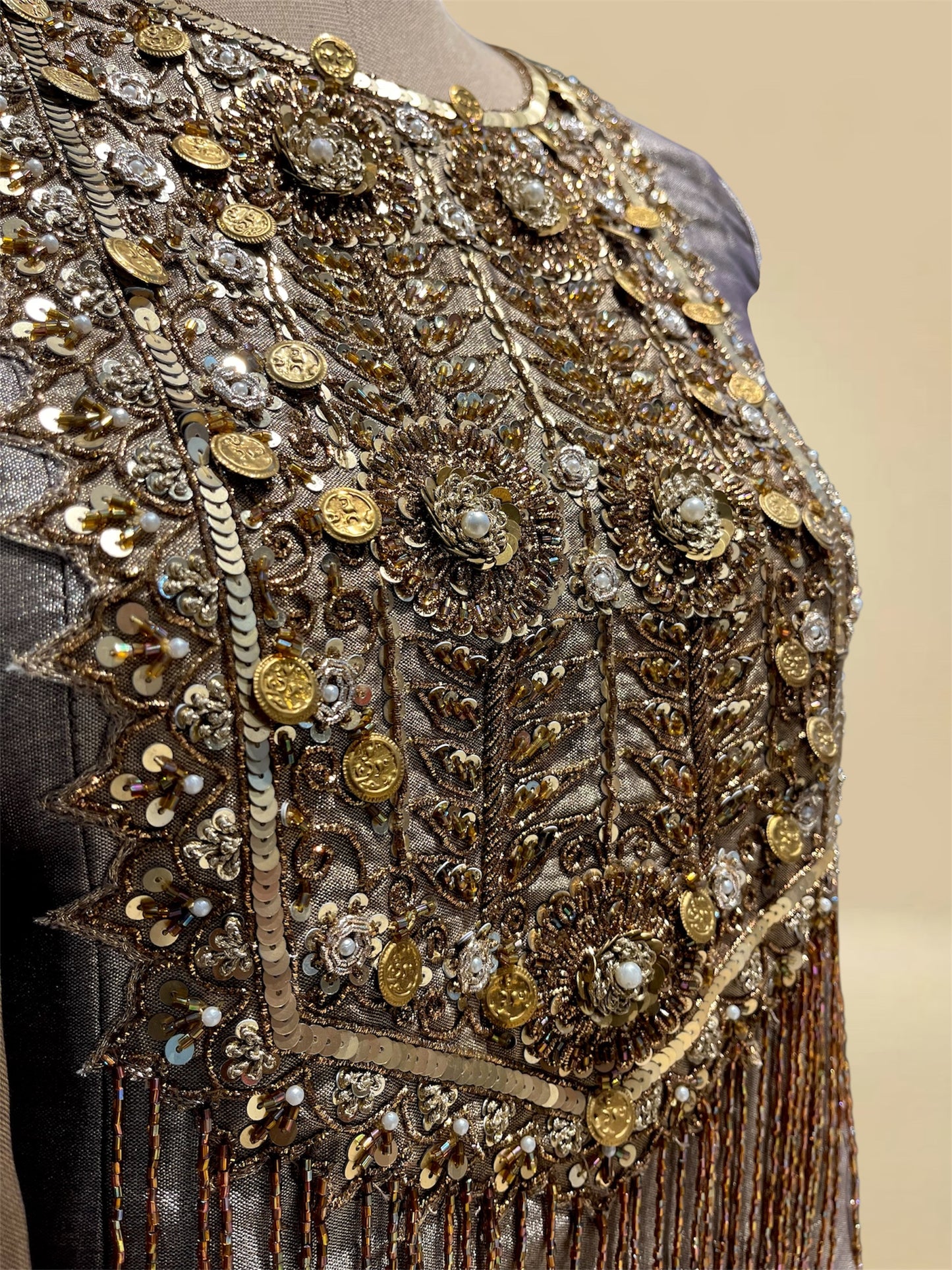 SILVER AND ANTIQUE GOLD CHANDERI TISSUE LEHENGA SET WITH SEQUIN & CUTDANA EMBROIDERED SHORT KURTI AND DUPATTA