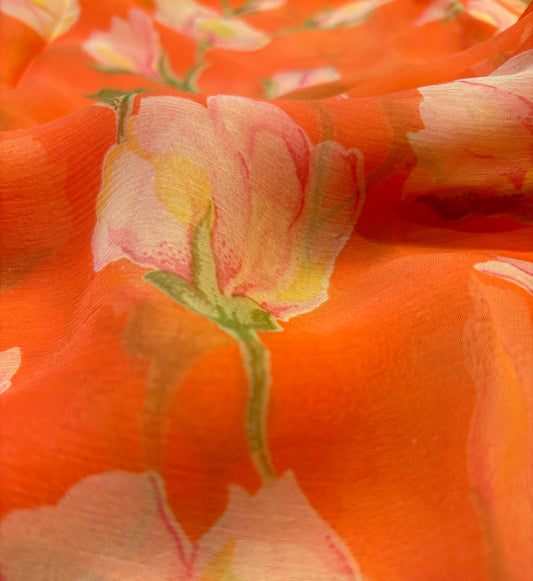 Coral colour printed chiffon saree with plain crepe blouse