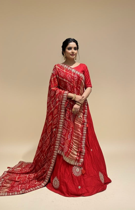 RED SATIN SILK LEHENGA WITH BANDHANI GAJI SILK DUPATTA EMBELLISHED WITH GOTA PATTI WORK