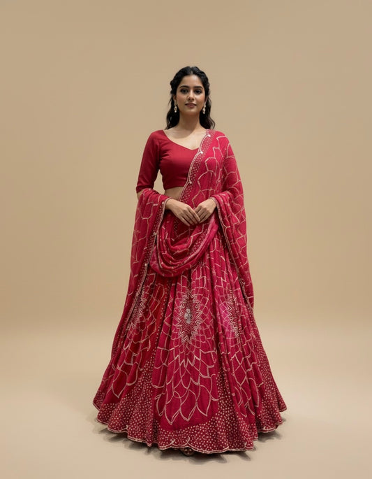 SHADED RED GEORGETTE BANDHANI LEHENGA EMBELLISHED WITH GOTA WORK