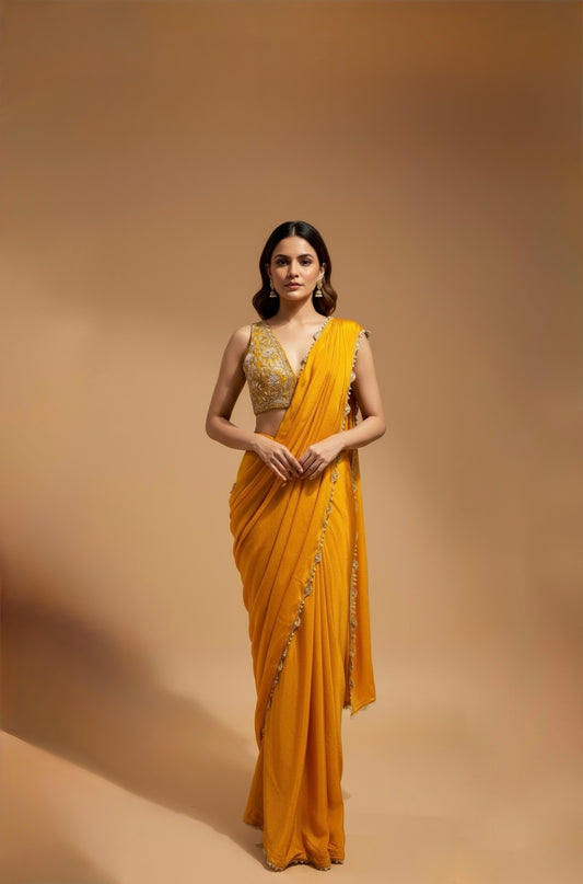 MARIGOLD COLOUR SAREE WITH ZARI & PEARL SCALLOP BORDER AND ZARI EMBROIDERED BLOUSE
