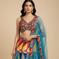 MULTICOLOURED DOLA SILK LEHENGA WITH NET DUPATTA AND CUTDANA & SEQUINS EMBELLISHED BLOUSE