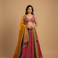RANI PINK AND OLIVE GREEN KASAB EMBROIDERED SILK LEHENGA WITH BANARASI BROCADE BLOUSE AND MUSTARD DUPATTA