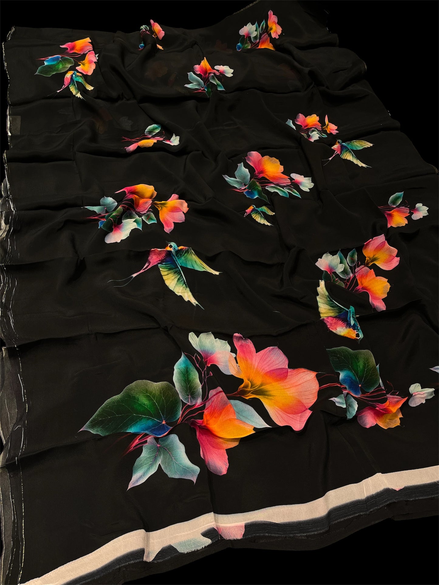 CHARCOAL BLACK CHINON PRINTED SAREE PAIRED WITH A PLAIN CREPE BLOUSE (DELIVERY IN 20 DAYS)